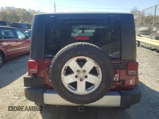 2010 Jeep Wrangler Sahara с VIN 1J4GA5D16AL225139, выставлен на аукционе Copart как лот 77114204 с пробегом Не указан миль и Списание • Salvage title. История ставок и продаж доступна на DreamBid. Изображение 6.