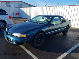 1996 Ford Thunderbird LX z VIN 1FALP62W1TH100925, wystawiony jako IAAI lot #41289811 z przebiegiem 84 056 mil mil oraz . Historia ofert i sprzedaży dostępna na DreamBid. Obrazek 18.