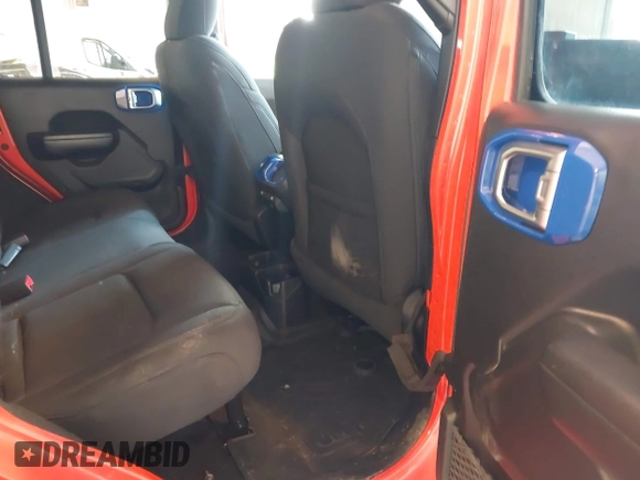 2023 Jeep Wrangler Sport with VIN 1C4HJXDG7PW676453, listed as a IAAI auction lot 42222995 with 32,347 mi miles and . Bid and sale history available at DreamBid. Image 8.