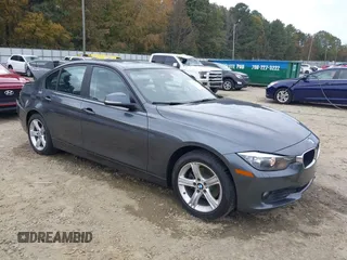 2014 BMW 3 Series 328d xDrive with VIN WBA3D5C59EKX96701, listed as a IAAI auction lot 40716972 with 163,775 mi miles. Bid and sale history available at carsss.com. Image 1.