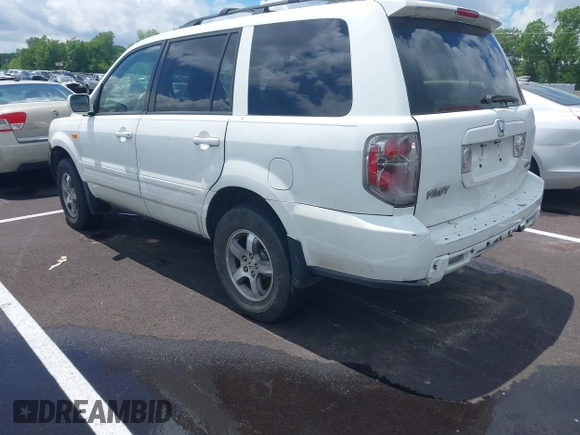 2007 Honda Pilot EX-L z VIN 5FNYF18627B024506, wystawiony jako IAAI lot #42220694 z przebiegiem 258 535 mil mil oraz . Historia ofert i sprzedaży dostępna na DreamBid. Obrazek 3.