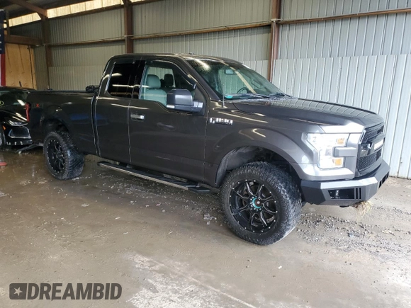 2015 Ford F-150 XLT with VIN 1FTFX1EG0FFD05618, listed as a Copart auction lot 61289795 with 91,836 mi miles and Salvage title. Bid and sale history available at DreamBid. Image 4.