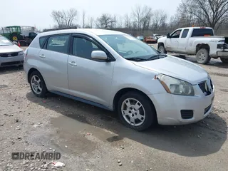 2009 Pontiac Vibe w/1SB with VIN 5Y2SP67009Z475895, listed as a IAAI auction lot 42123456 with 177,484 mi miles. Bid and sale history available at carsss.com. Image 1.