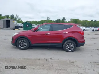 2016 Hyundai Santa Fe z VIN 5XYZTDLBXGG353241, wystawiony jako IAAI lot #42328420 z przebiegiem 120 925 mil mil oraz . Historia ofert i sprzedaży dostępna na DreamBid. Obrazek 14.