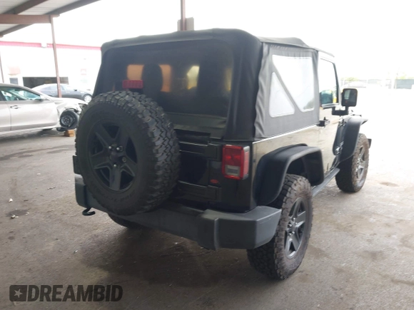 2015 Jeep Wrangler Sport with VIN 1C4AJWAG8FL550635, listed as a IAAI auction lot 42116285 with 111,782 mi miles. Bid and sale history available at carsss.com. Image 4.