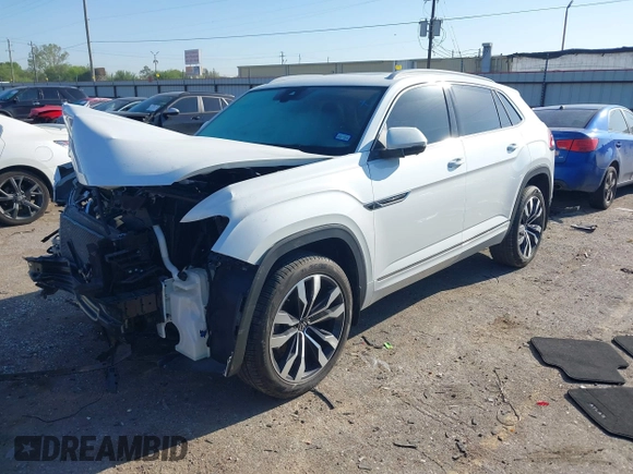 2022 Volkswagen Atlas SEL Premium R-Line with VIN 1V2FE2CA6NC220596, listed as a IAAI auction lot 41864407 with 13,120 mi miles and . Bid and sale history available at DreamBid. Image 2.