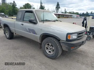 1994 Mazda B-Series Truck LE z VIN 4F4DR17XXRTN00489, wystawiony jako IAAI lot #42532015 z przebiegiem 146 502 mil mil oraz . Historia ofert i sprzedaży dostępna na DreamBid. Obrazek 1.