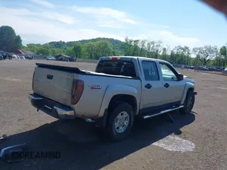 2005 GMC Canyon 1SF SLE Z71 z VIN 1GTDT136658195884, wystawiony jako IAAI lot #42243052 z przebiegiem 146 432 mil mil oraz . Historia ofert i sprzedaży dostępna na DreamBid. Obrazek 4.