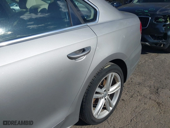 2013 Volkswagen Passat TDI SE with VIN 1VWBN7A34DC103273, listed as a IAAI auction lot 42051516 with 105,607 mi miles. Bid and sale history available at carsss.com. Image 6.