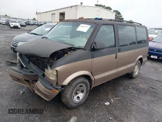 1999 GMC Safari with VIN 1GKDM19WXXB523158, listed as a IAAI auction lot 37840214 with Not Provided miles. Bid and sale history available at carsss.com. Image 2.