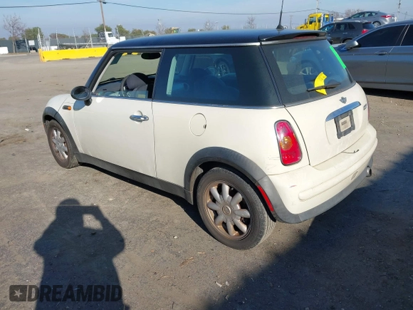 2003 MINI Hardtop with VIN WMWRC33433TE14150, listed as a IAAI auction lot 41313860 with 209,684 mi miles and . Bid and sale history available at DreamBid. Image 3.
