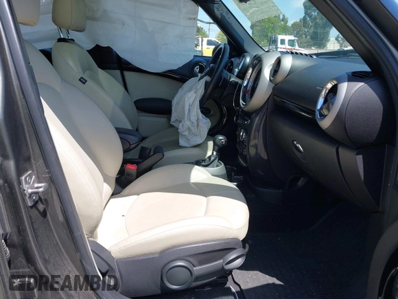 2012 MINI Countryman S with VIN WMWZC3C53CWL83664, listed as a IAAI auction lot 42062673 with 102,615 mi miles and . Bid and sale history available at DreamBid. Image 5.