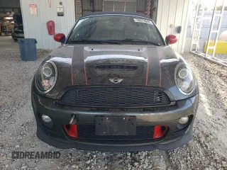 2015 MINI Roadster S z VIN WMWSY3C59FT566785, wystawiony jako Copart lot #73574064 z przebiegiem 96 623 mil mil oraz Tytuł czysty. Historia ofert i sprzedaży dostępna na DreamBid. Obrazek 5.