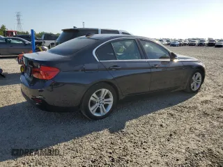 2017 BMW 3 Series 330i xDrive with VIN WBA8D9C38HA005368, listed as a Copart auction lot 52611265 with 106,972 mi miles and Salvage title. Bid and sale history available at DreamBid. Image 3.