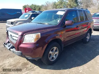 2007 Honda Pilot EX-L with VIN 5FNYF28537B018338, listed as a IAAI auction lot 41870291 with 201,446 mi miles. Bid and sale history available at carsss.com. Image 2.