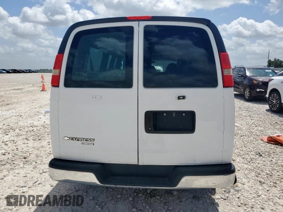2014 Chevrolet Express Passenger LT с VIN 1GAZG1FGXE1106737, выставлен на аукционе Copart как лот 62956805 с пробегом 267 908 миль миль и Чистый • Clean title. История ставок и продаж доступна на DreamBid. Изображение 6.