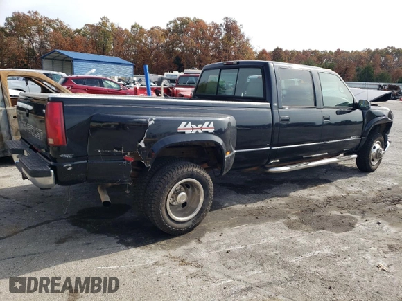 2000 Chevrolet Silverado 3500 z VIN 1GCHK33J5YF400969, wystawiony jako Copart lot #87955445 z przebiegiem 114 683 mil mil oraz Szkody całkowita. Historia ofert i sprzedaży dostępna na DreamBid. Obrazek 3.