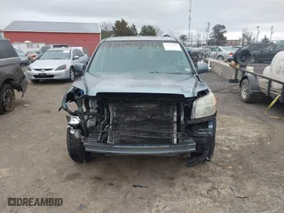 2006 Honda Pilot EX-L with RES with VIN 2HKYF18646H555514, listed as a IAAI auction lot 41703223 with 292,487 mi miles. Bid and sale history available at carsss.com. Image 13.
