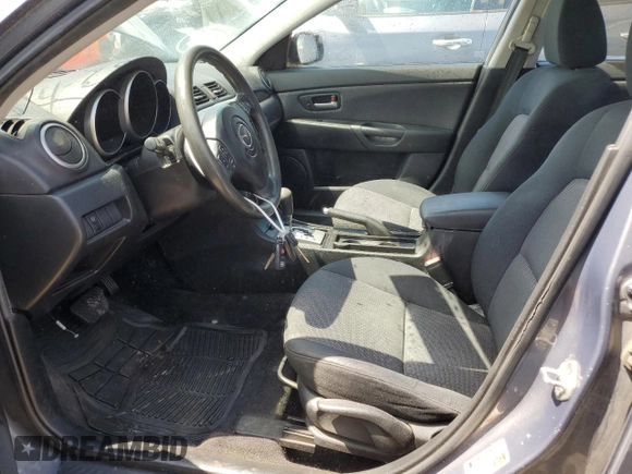 2007 Mazda 3 i Touring with VIN JM1BK12F771613103, listed as a Copart auction lot 52523994 with 259,387 mi miles and Salvage Title. Bid and sale history available at DreamBid. Image 7.