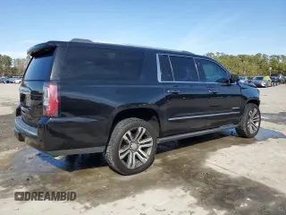2019 GMC Yukon XL Denali with VIN 1GKS2HKJ9KR264134, listed as a Copart auction lot 43138545 with 105,690 mi miles and Salvage Title. Bid and sale history available at DreamBid. Image 3.