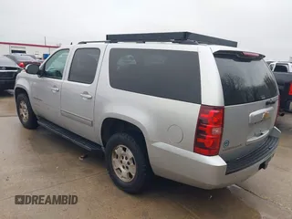 2014 Chevrolet Suburban LS with VIN 1GNSCHE08ER217393, listed as a IAAI auction lot 41563635 with 212,852 mi miles. Bid and sale history available at carsss.com. Image 3.