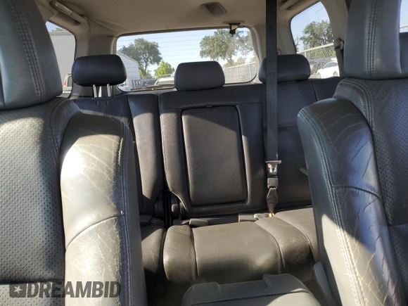 2005 Honda Pilot EX-L z VIN 2HKYF18635H569581, wystawiony jako Copart lot #57295595 z przebiegiem 209 697 mil mil oraz Szkoda całkowita • Salvage title. Historia ofert i sprzedaży dostępna na DreamBid. Obrazek 10.