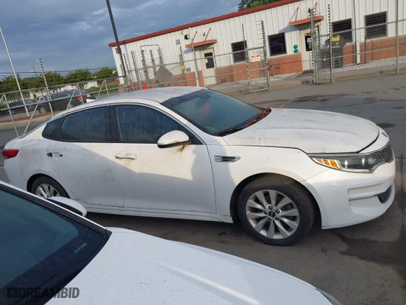 2016 Kia Optima EX with VIN 5XXGU4L38GG008436, listed as a IAAI auction lot 42094498 with 134,781 mi miles. Bid and sale history available at carsss.com. Image 13.