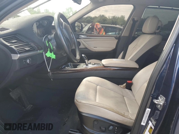 2012 BMW X5 35i with VIN 5UXZV4C56CL754643, listed as a Copart auction lot 55970125 with 150,584 mi miles and Salvage title. Bid and sale history available at DreamBid. Image 7.