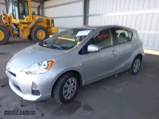 2014 Toyota Prius c One with VIN JTDKDTB39E1561353, listed as a IAAI auction lot 40986431 with 73,737 mi miles. Bid and sale history available at carsss.com. Image 16.