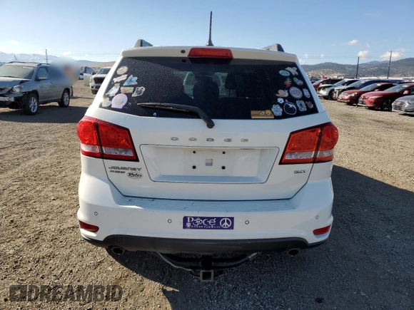 2013 Dodge Journey SXT с VIN 3C4PDDBG1DT685395, выставлен на аукционе Copart как лот 49817045 с пробегом 101 198 миль миль и Списание • Salvage title. История ставок и продаж доступна на DreamBid. Изображение 6.