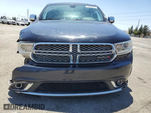 2014 Dodge Durango Citadel with VIN 1C4SDJET1EC594240, listed as a Copart auction lot 58090285 with 160,027 mi miles and Salvage title. Bid and sale history available at DreamBid. Image 5.