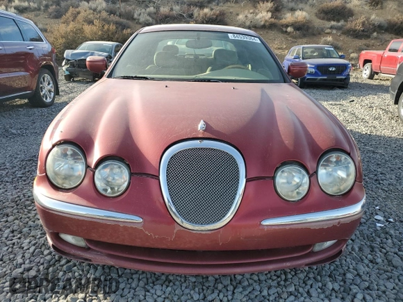 2000 Jaguar S-Type V8 z VIN SAJDA01D7YGL57521, wystawiony jako Copart lot #84539364 z przebiegiem Nie podano mil oraz Szkoda całkowita • Salvage title. Historia ofert i sprzedaży dostępna na DreamBid. Obrazek 5.