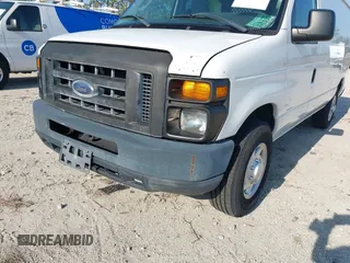 2012 Ford Econoline Cargo Commercial with VIN 1FTNE2EL1CDB15063, listed as a IAAI auction lot 41861426 with 167,961 mi miles and . Bid and sale history available at DreamBid. Image 6.