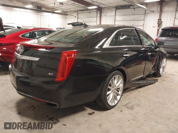2014 Cadillac XTS Platinum with VIN 2G61W5S88E9186969, listed as a IAAI auction lot 41422872 with 184,998 mi miles and . Bid and sale history available at DreamBid. Image 4.