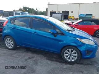 2013 Ford Fiesta SE with VIN 3FADP4EJ0DM202271, listed as a IAAI auction lot 41496985 with 174,624 mi miles. Bid and sale history available at carsss.com. Image 6.