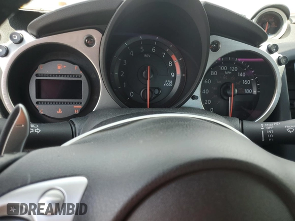 2014 Nissan 370Z with VIN JN1AZ4EH6EM633797, listed as a Copart auction lot 74027354 with Not Provided miles and Salvage Title. Bid and sale history available at DreamBid. Image 9.