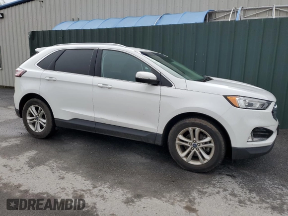 2020 Ford Edge SEL z VIN 2FMPK3J90LBB01559, wystawiony jako Copart lot #61365305 z przebiegiem 120 050 mil mil oraz Czysty tytuł • Clean title. Historia ofert i sprzedaży dostępna na DreamBid. Obrazek 4.