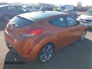 2013 Hyundai Veloster w/Gray Int with VIN KMHTC6AD6DU122025, listed as a IAAI auction lot 41551623 with 189,793 mi miles. Bid and sale history available at carsss.com. Image 4.