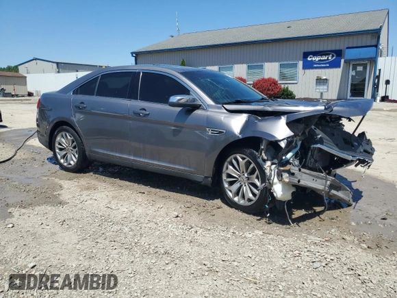 2013 Ford Taurus Limited with VIN 1FAHP2F85DG225363, listed as a Copart auction lot 56127255 with 128,660 mi miles and Salvage title. Bid and sale history available at DreamBid. Image 4.