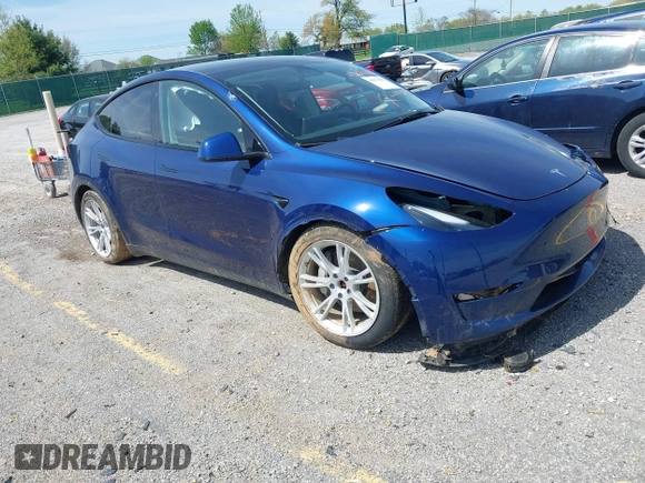 2023 Tesla Model Y Long Range with VIN 7SAYGDEE7PF702051, listed as a IAAI auction lot 42074182 with 50,473 mi miles and . Bid and sale history available at DreamBid. Image 1.