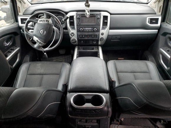 2018 Nissan Titan Pro-4X z VIN 1N6AA1E58JN523036, wystawiony jako Copart lot #45383075 z przebiegiem 153 047 mil mil oraz Czysty tytuł • Clean title. Historia ofert i sprzedaży dostępna na DreamBid. Obrazek 8.