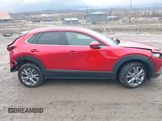 2023 Mazda CX-30 2.5 S Select Package with VIN 3MVDMBBM0PM546997, listed as a IAAI auction lot 41923358 with 28,606 mi miles. Bid and sale history available at carsss.com. Image 13.