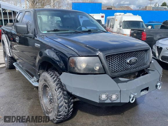 2005 Ford F-150 STX with VIN 1FTRX14W15NB53391, listed as a Copart auction lot 50452905 with 169,403 mi miles and Salvage Title. Bid and sale history available at carsss.com. Image 1.