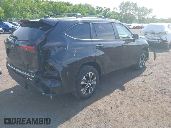 2023 Toyota Highlander L with VIN 5TDKDRBHXPS030361, listed as a IAAI auction lot 42230419 with 59,404 mi miles and . Bid and sale history available at DreamBid. Image 4.