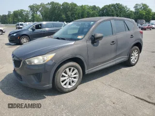 2014 Mazda CX-5 Sport z VIN JM3KE4BE8E0336035, wystawiony jako Copart lot #59459895 z przebiegiem 138 936 mil mil oraz Czysty tytuł • Clean title. Historia ofert i sprzedaży dostępna na DreamBid. Obrazek 1.