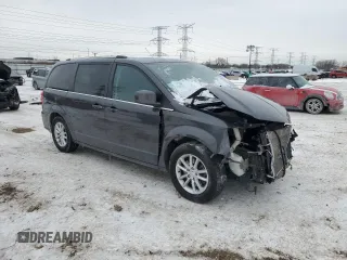 2019 Dodge Grand Caravan SXT with VIN 2C4RDGCG2KR580583, listed as a Copart auction lot 45134255 with 83,746 mi miles and Salvage Title. Bid and sale history available at DreamBid. Image 4.