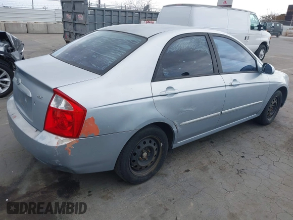 2005 Kia Spectra LX with VIN KNAFE121755142490, listed as a IAAI auction lot 42085928 with 170,406 mi miles. Bid and sale history available at carsss.com. Image 4.