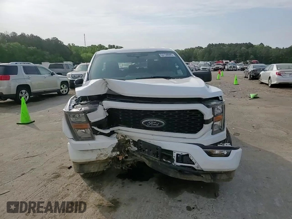 2023 Ford F-150 XL with VIN 1FTEX1EP8PKF69707, listed as a Copart auction lot 53138065 with 18,816 mi miles and Salvage title. Bid and sale history available at DreamBid. Image 11.