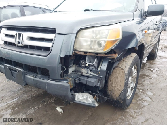 2006 Honda Pilot EX-L with RES with VIN 2HKYF18676H551683, listed as a IAAI auction lot 41501000 with 288,473 mi miles. Bid and sale history available at carsss.com. Image 6.