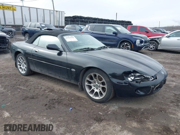 1997 Jaguar XK with VIN SAJGX274XVC017622, listed as a IAAI auction lot 41614339 with 94,298 mi miles and . Bid and sale history available at DreamBid. Image 1.